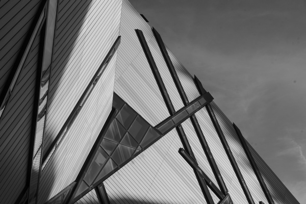 black and white picture of the ROM against the sky