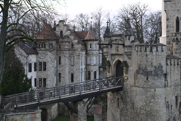 fort buildings with a drawbridge in the foreground