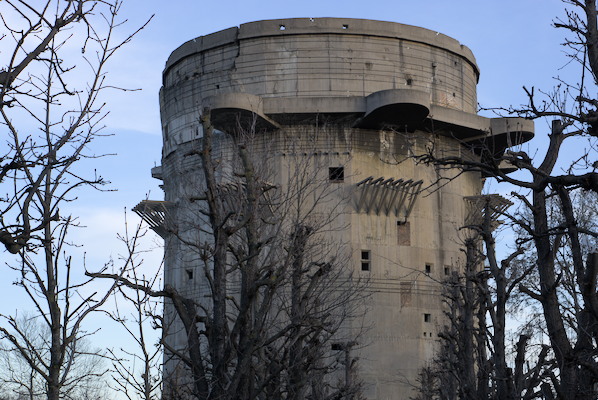 ugly flak tower with some trees in winter
