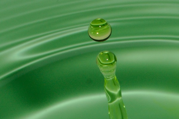 drop of green water and back-jet