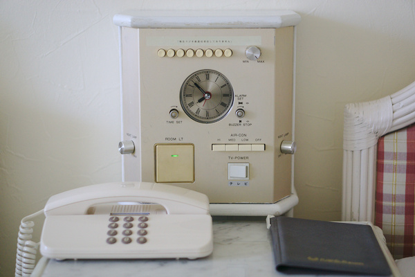 an old-fashioned control panel with many buttons